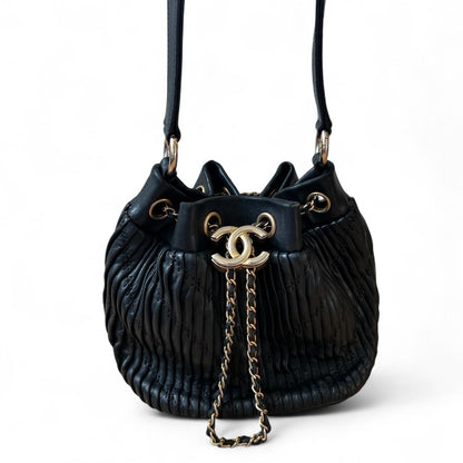Chanel Coco mini pleated handbag